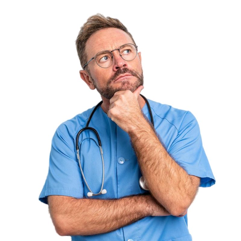 A male medical professional in blue scrubs and wearing glasses appears thoughtful, resting his chin on his hand, with a stethoscope around his neck.
