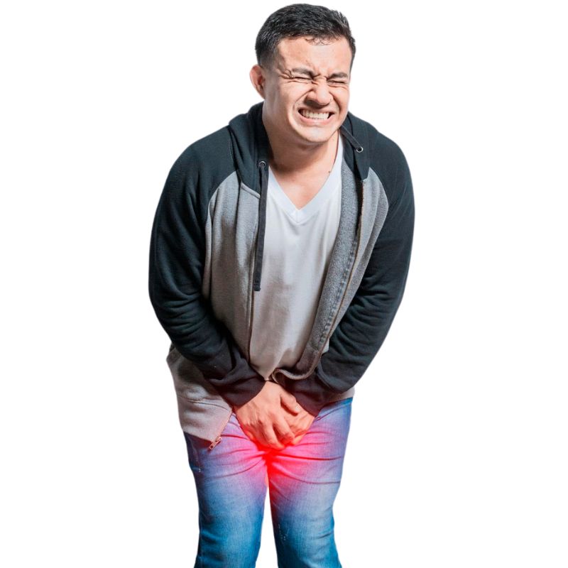 A man wearing a hoodie and jeans clutches his groin area in pain, with a red glow indicating discomfort or injury in that region. Could this be a case of what is Candida albicans at work?