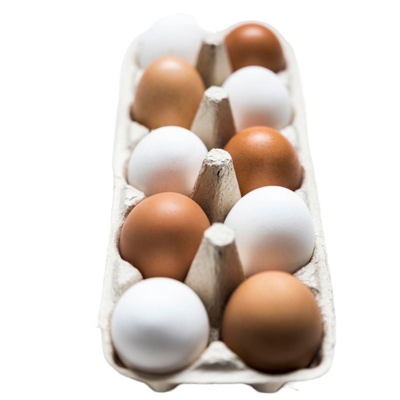 A carton containing six brown and six white eggs arranged in a single row on a white background.