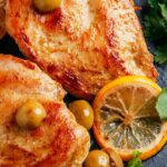 Roasted turkey breast with fresh lemon slices and herbs, a Candida-friendly holiday main dish rich in flavor and gut-supportive ingredients.